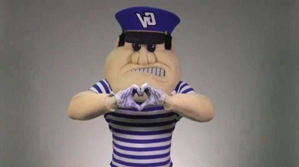 Louie the Laker making a heart with his hands